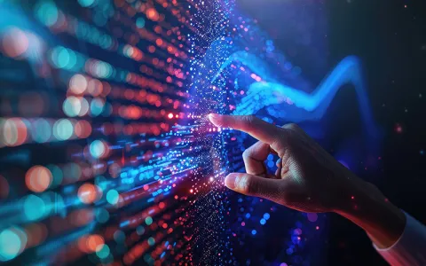 Hand reaching out and touching a wall of lights